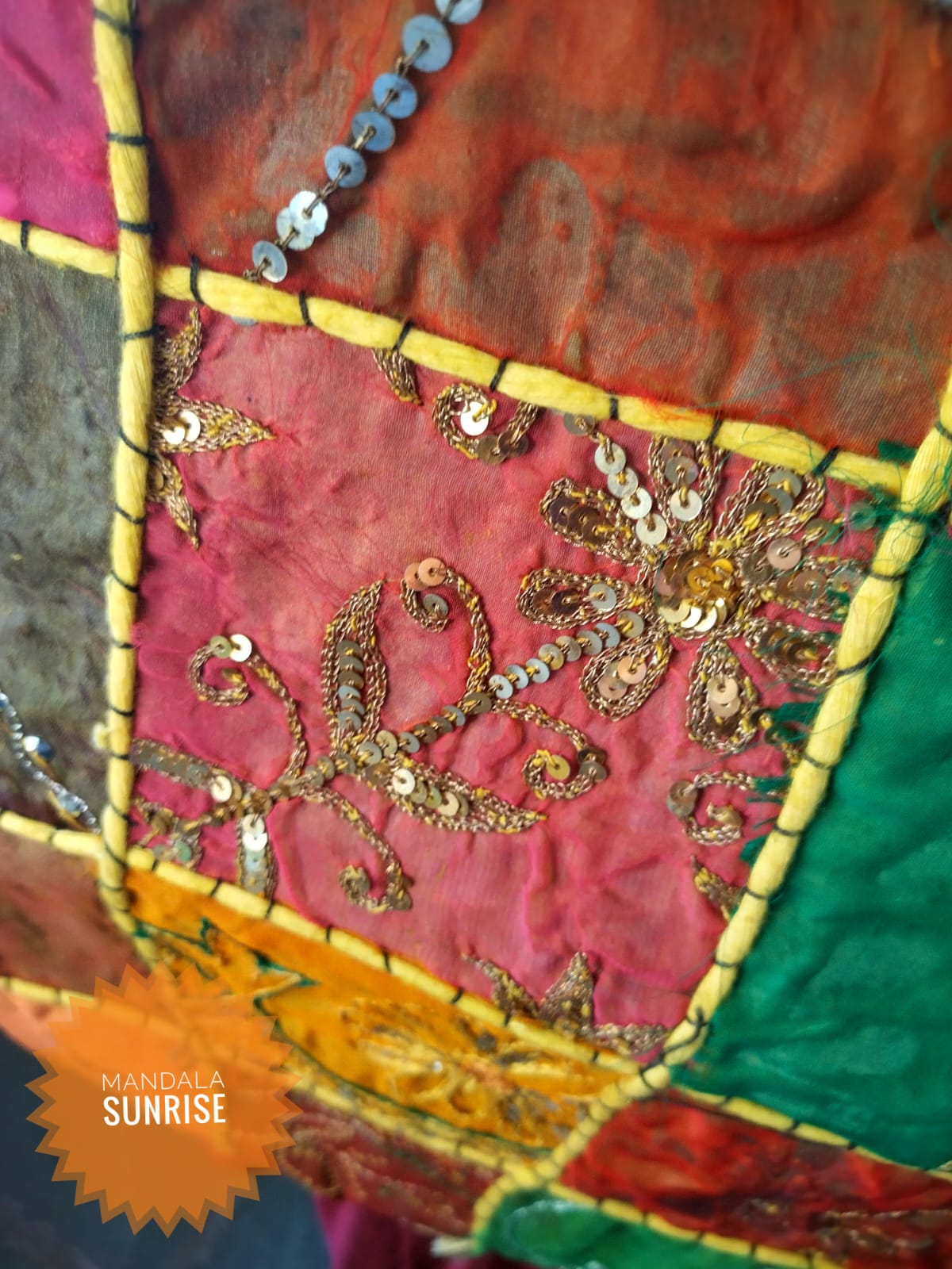 Patchwork zipped bag with features shells on straps