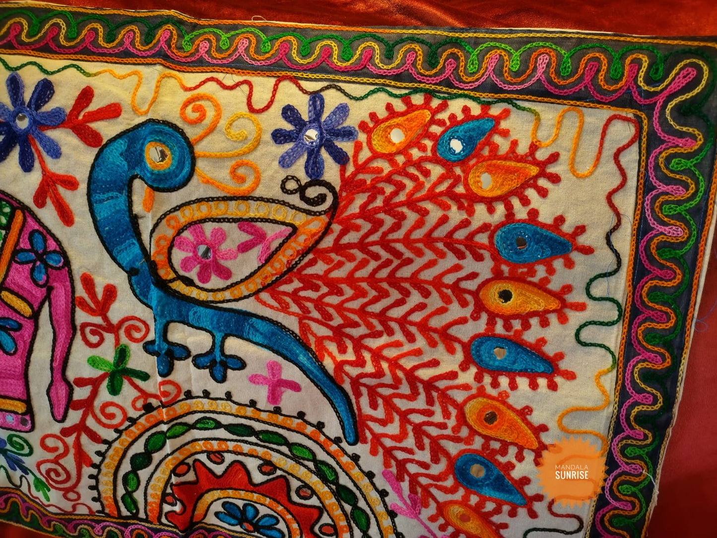 Peacock and elephant brightly coloured embroidered wall hanging